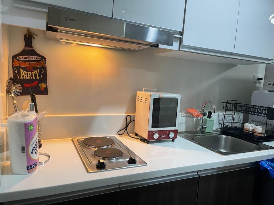 Cozy 1BR w/ Balcony Unli Wifi @ AIR Residences Apartment in Makati