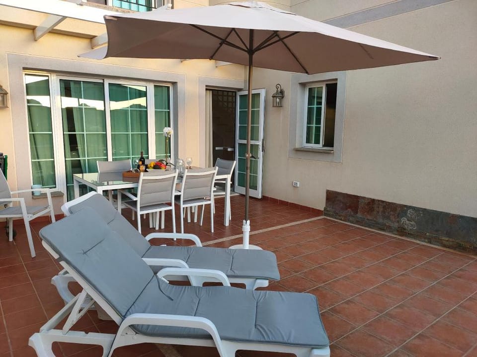 Comfortable modern house, in a complex with a swimming pool Apartment in Puerto Rico de Gran Canaria