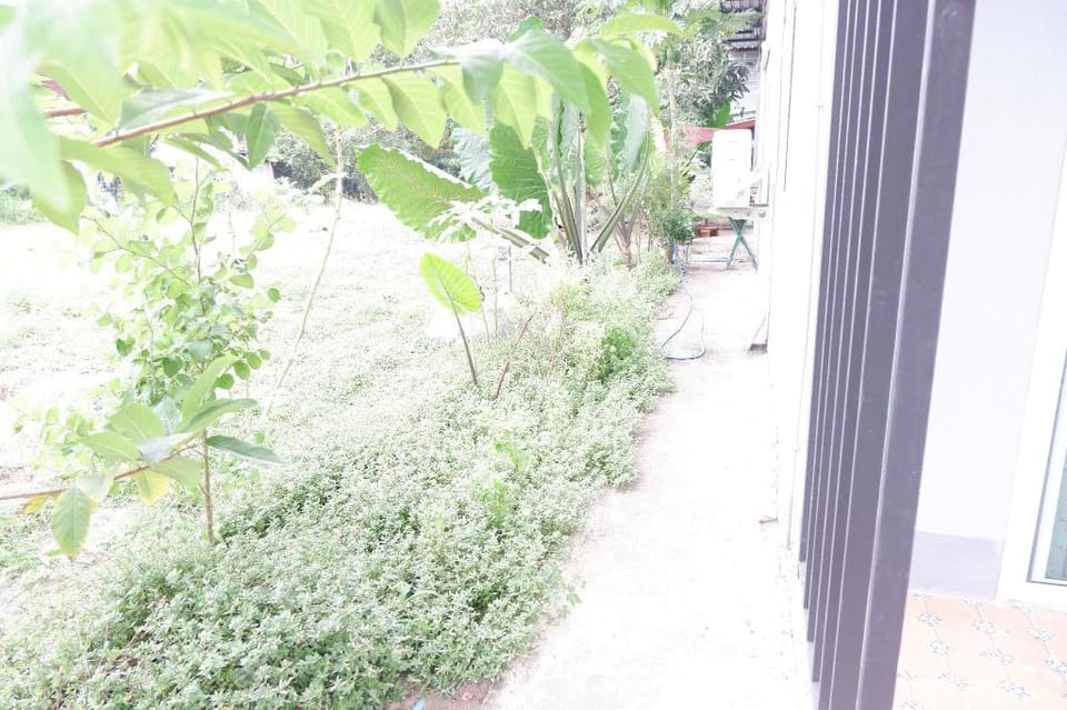 SP ทรัพย์เพิ่มพูลโฮมสเตย์ บึงโขงหลง ห้องสีขาว Vacation rental in Laos