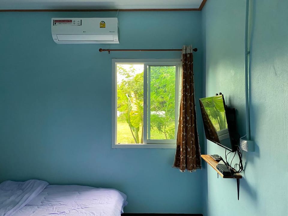 Phempun Home Stay, Buengkhonglong, Blue Room Vacation rental in Laos
