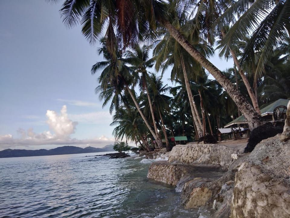 Welcoming comfy room #1 with queen size bed Vacation rental in Siargao Island