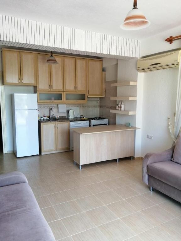 SAHİLE YÜRÜYÜŞ MESAFESİNDE HUZUR SİZİ BEKLİYOR Apartment in Side