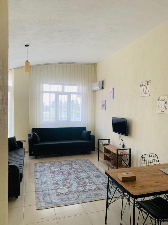 A PEACEFUL ENVIRONMENT AWAITS YOU!!! Apartment in Side