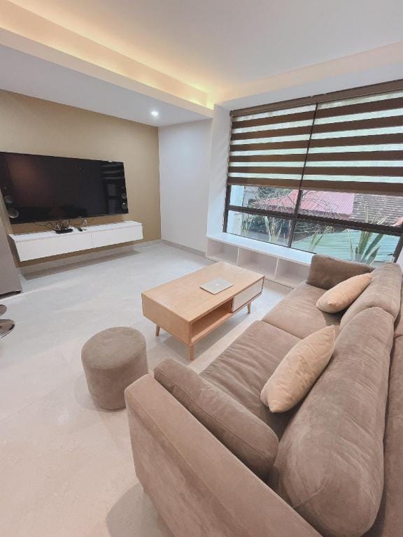 Nhà 9+ Apartment in Laos