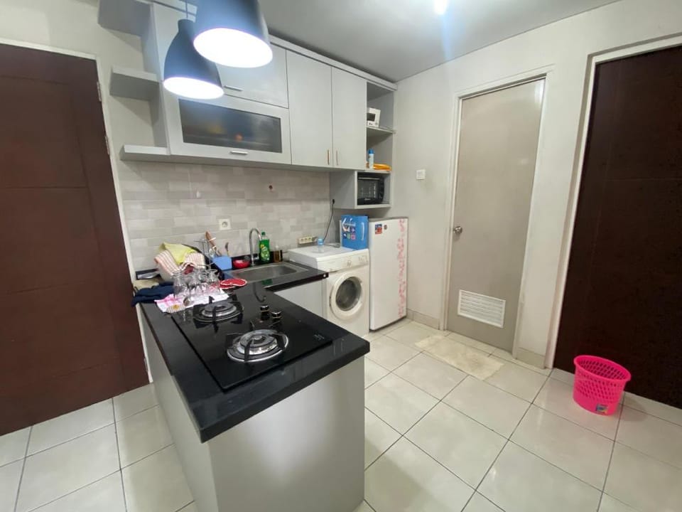 Comfort and Strategic 2BR at Cosmopolis Apartment Apartment in Surabaya