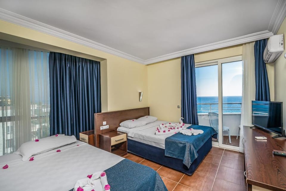 the beach is sandy. Apartment in Alanya