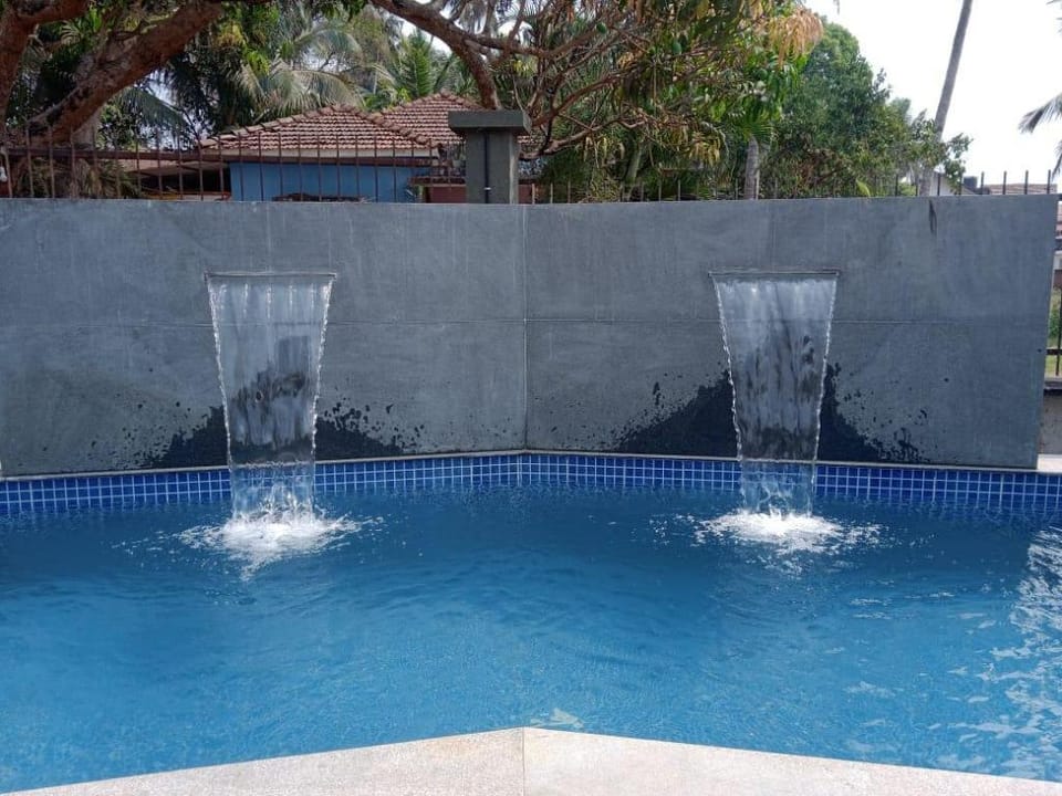 Lovely, tranquil 2bhk-Kitchen+AC+Wifi+Pool+parking Apartment in Goa, India