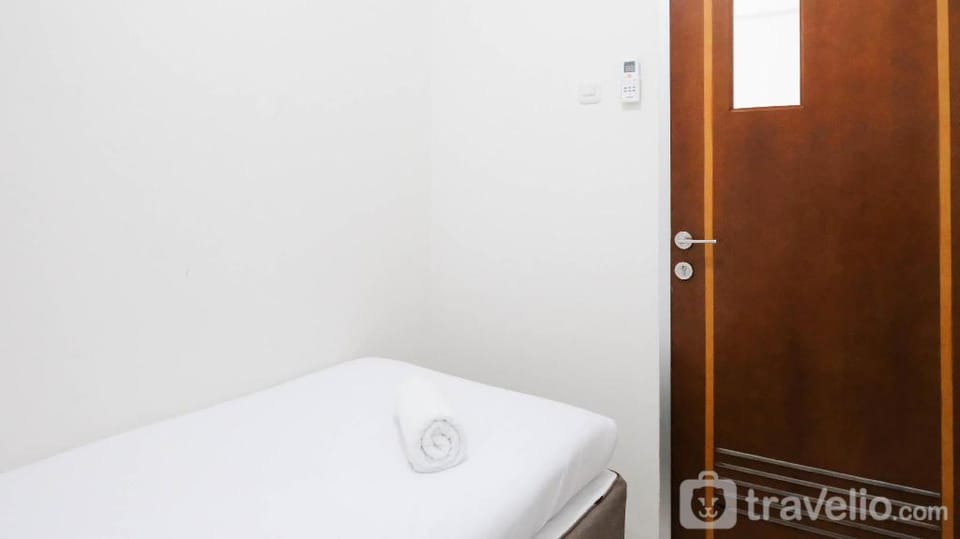 Modern and Homey 2BR Puncak Kertajaya By Travelio Apartment in Surabaya