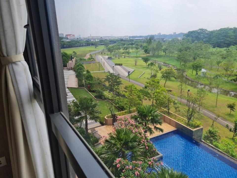 Marigold nava park (botanica park view) Apartment in West Java