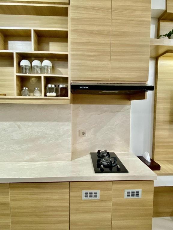 Lovely Apartment With Pool and Gym at TSM Cibubur Apartment in West Java
