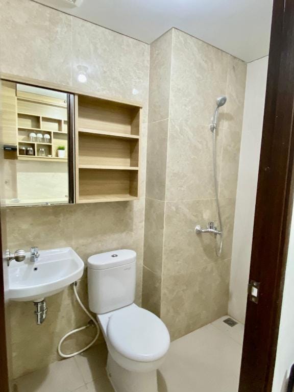 Lovely Apartment With Pool and Gym at TSM Cibubur Apartment in West Java