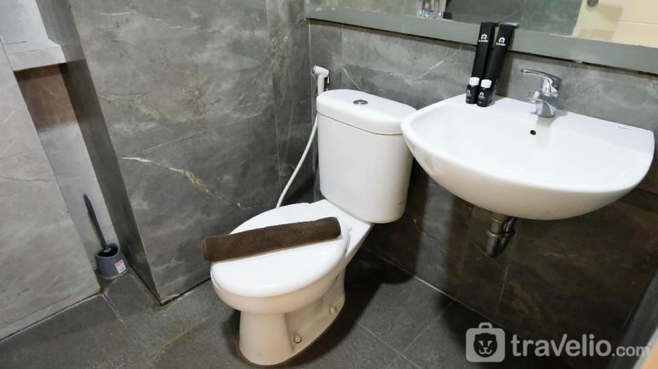 Spacey Homey 2BR at Supermall Mansion By Travelio Apartment in Surabaya