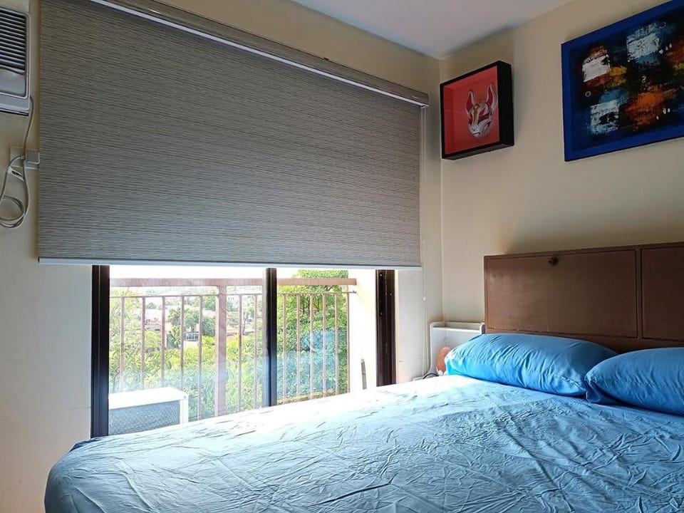 Minimalist 2 Bedroom Unit with Pool and Books Apartment in Paranaque
