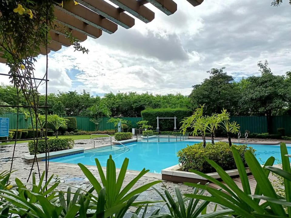 Minimalist 2 Bedroom Unit with Pool and Books Apartment in Paranaque
