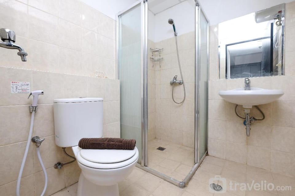Nice and Elegant 1BR The Wave Kuningan By Travelio Apartment in South Jakarta City