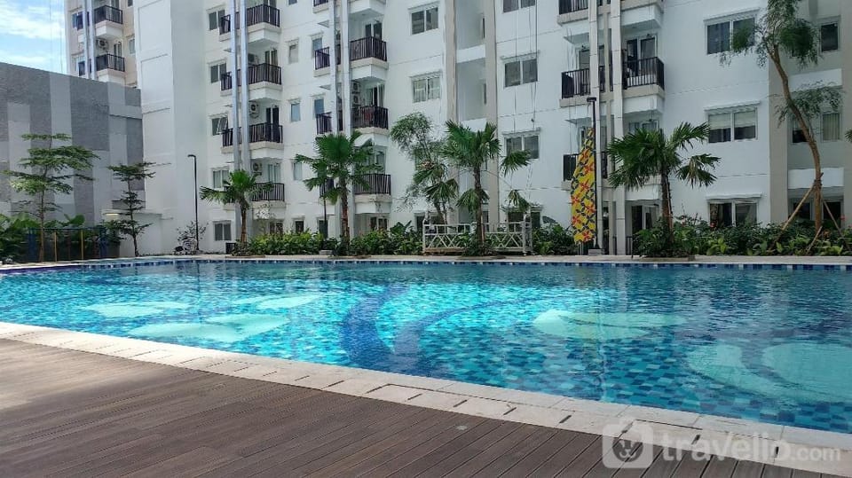 Cozy Tidy 2BR at Signature Park Grande By Travelio Apartment in South Jakarta City