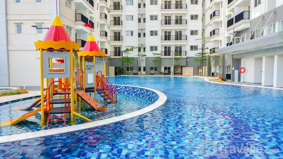 Cozy Tidy 2BR at Signature Park Grande By Travelio Apartment in South Jakarta City