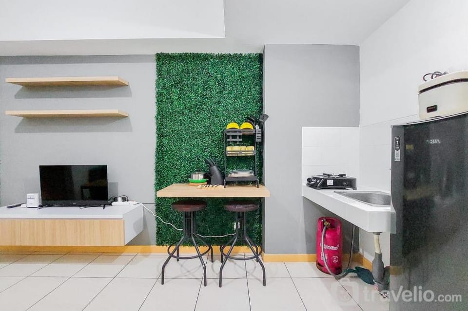 Designed Comfort 2BR M-Town Residence By Travelio Apartment in West Java