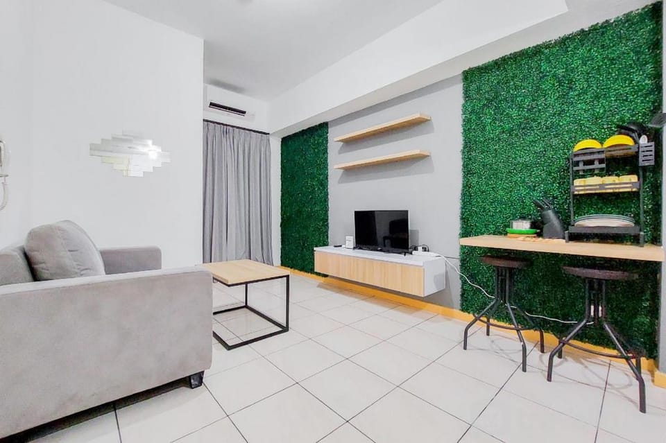 Designed Comfort 2BR M-Town Residence By Travelio Apartment in West Java