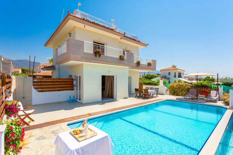 Kalisto Beach Villa: Large Private Pool, Walk to Beach, Sea Views, A/C, WiFi, Car Not Required       Apartment in Paphos District
