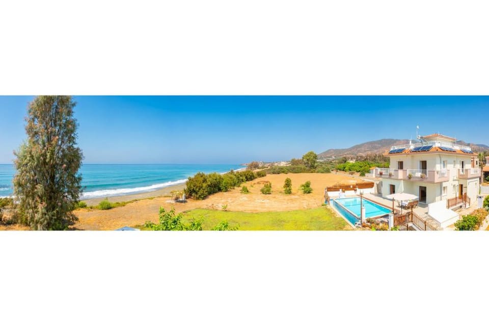 Kalisto Beach Villa: Large Private Pool, Walk to Beach, Sea Views, A/C, WiFi, Car Not Required       Apartment in Paphos District