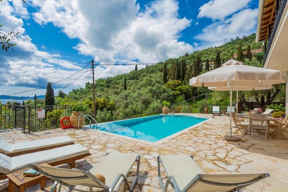 Villa Katerina: Large Private Pool, Walk to Beach, Sea Views, A/C, WiFi, Car Not Required            Apartment in Corfu, Greece