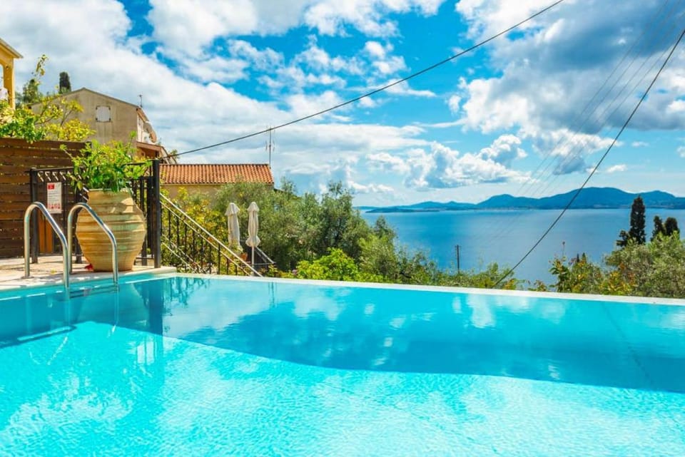 Villa Katerina: Large Private Pool, Walk to Beach, Sea Views, A/C, WiFi, Car Not Required            Apartment in Corfu, Greece