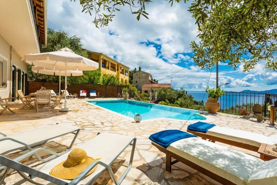 Villa Katerina: Large Private Pool, Walk to Beach, Sea Views, A/C, WiFi, Car Not Required            Apartment in Corfu, Greece