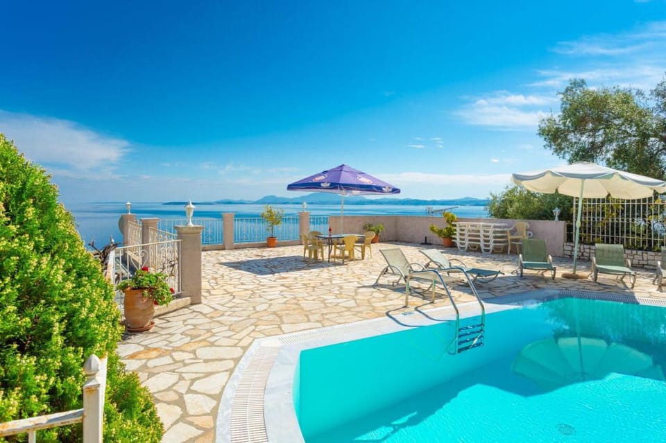 Michalis: Large Private Pool, Walk to Beach, Sea Views, A/C, WiFi, Car Not Required, Eco-Friendly    Apartment in Corfu, Greece