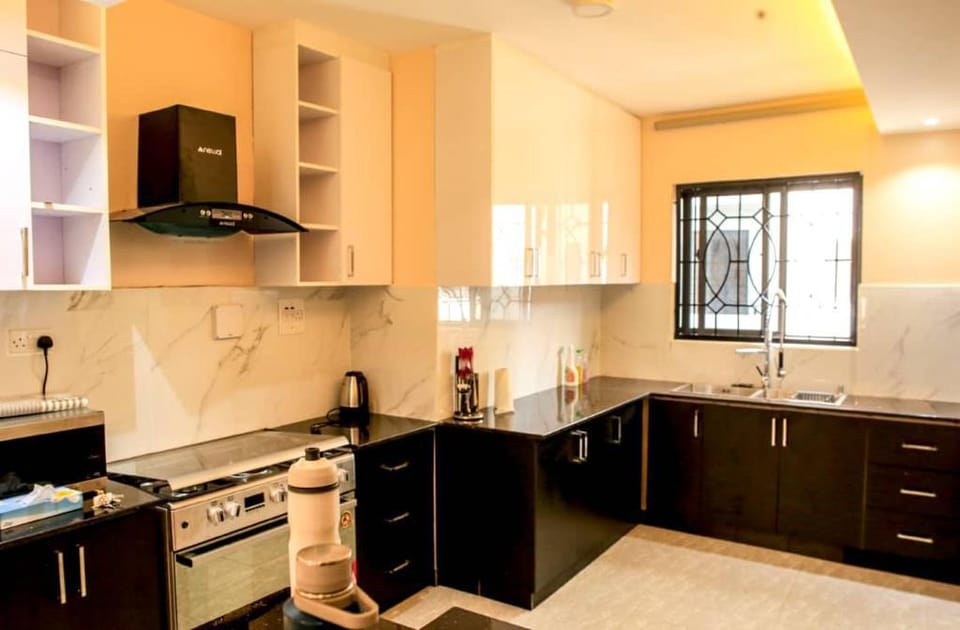 Balconies & Roof top patio boast stunning views Apartment in Kampala