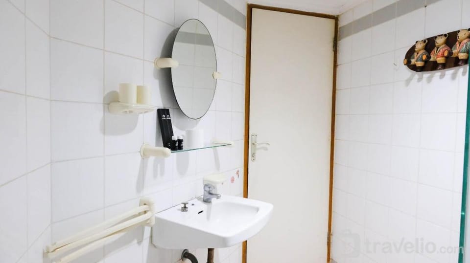 Homey 2BR Kondominium Puncak Marina By Travelio Apartment in Surabaya