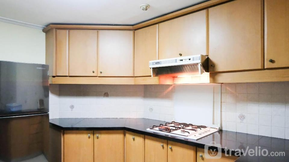 Homey 2BR Kondominium Puncak Marina By Travelio Apartment in Surabaya