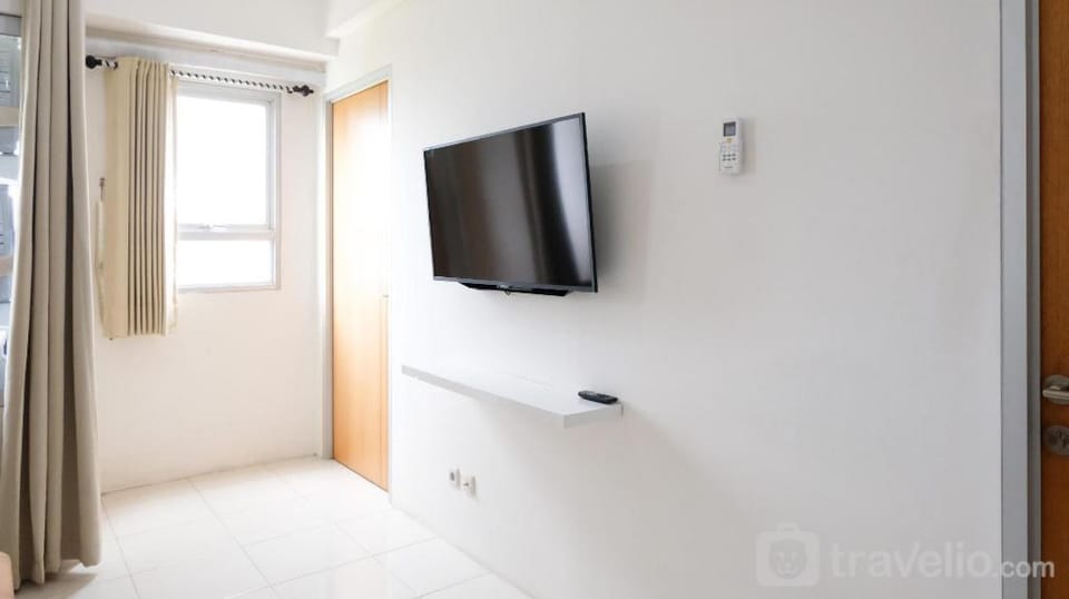 Good Best Choice 2BR at Puncak Permai By Travelio Apartment in Surabaya