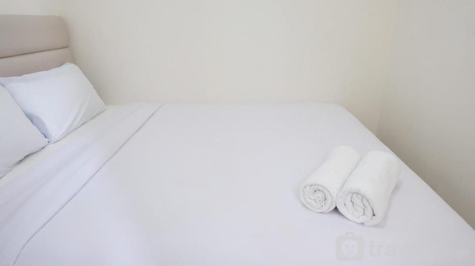 Homey 2BR at Puncak Permai Apartment By Travelio Apartment in Surabaya