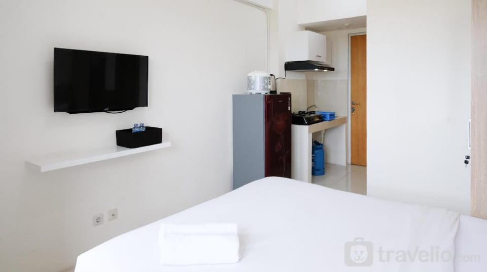 Cozy Stay Studio at Puncak Permai Apt By Travelio Apartment in Surabaya