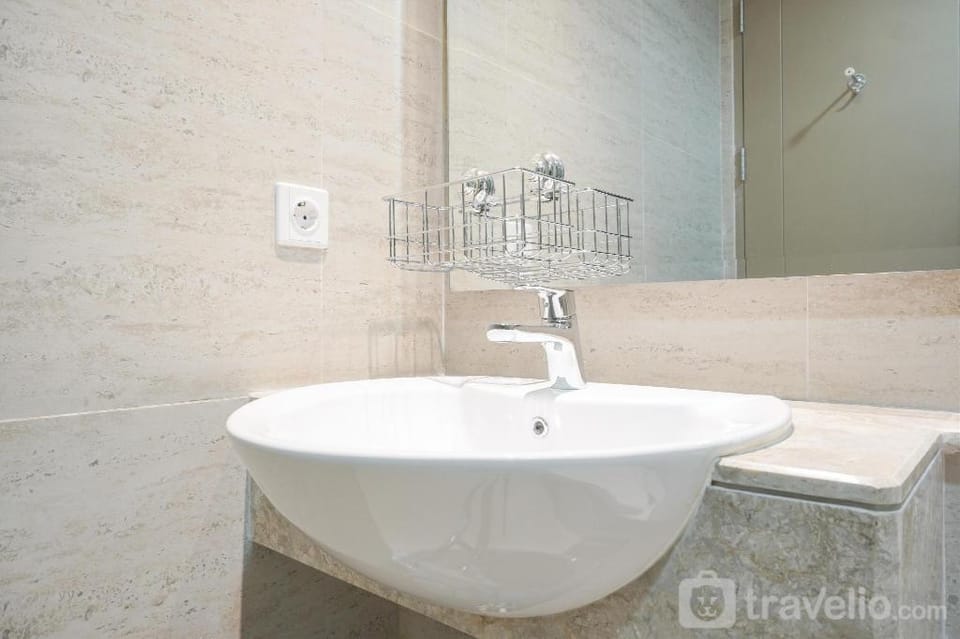 Fancy & Comfort 1BR at Gold Coast Apt By Travelio Apartment in Jakarta