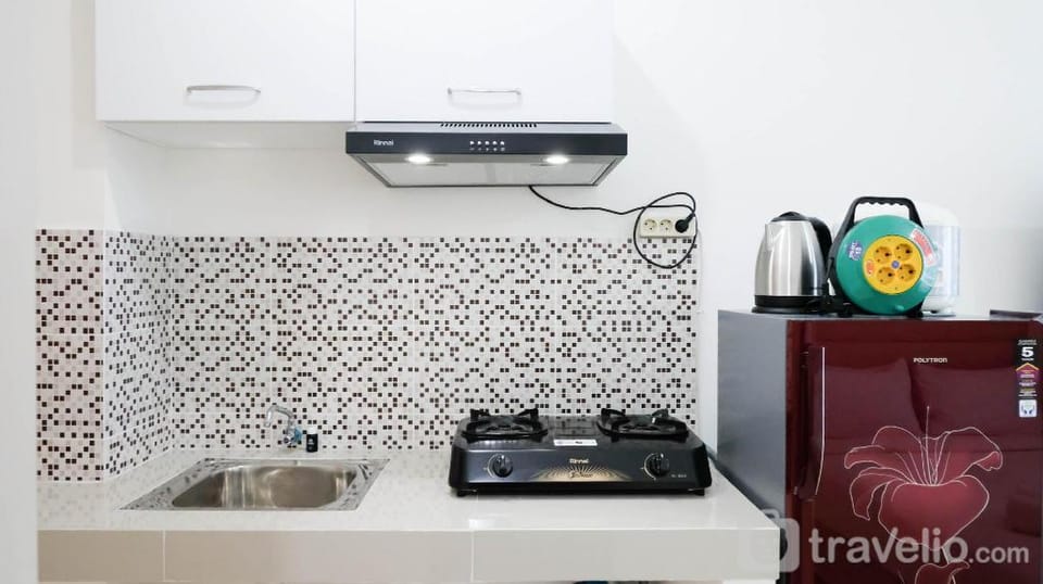 HomeyComfy Studio at Puncak Bukit Golf By Travelio Apartment in Surabaya