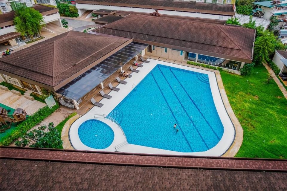 Leila: A Modern Tropical Pad at Bamboo Bay Apartment in Lapu-Lapu City