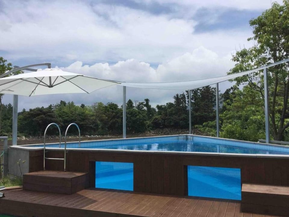 Bijarim_pension 천년비자 펜션 제주 힐링숲 비자림 입구 먼바다전망 201호 Vacation rental in South Korea