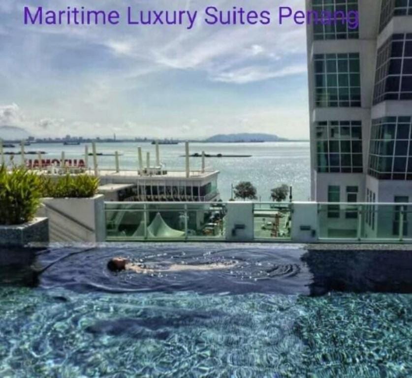 Maritime @ Sunrise+Sea View 105 Apartment in George Town
