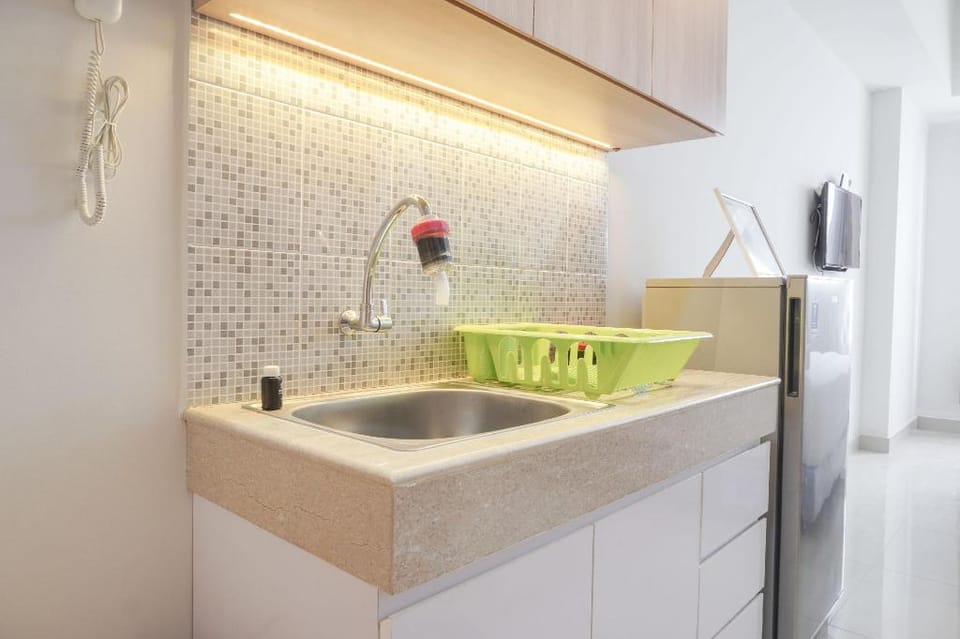 Comfy Studio at Evenciio Margonda By Travelio Apartment in South Jakarta City