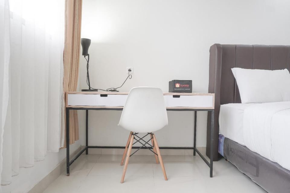 Comfy Studio at Evenciio Margonda By Travelio Apartment in South Jakarta City