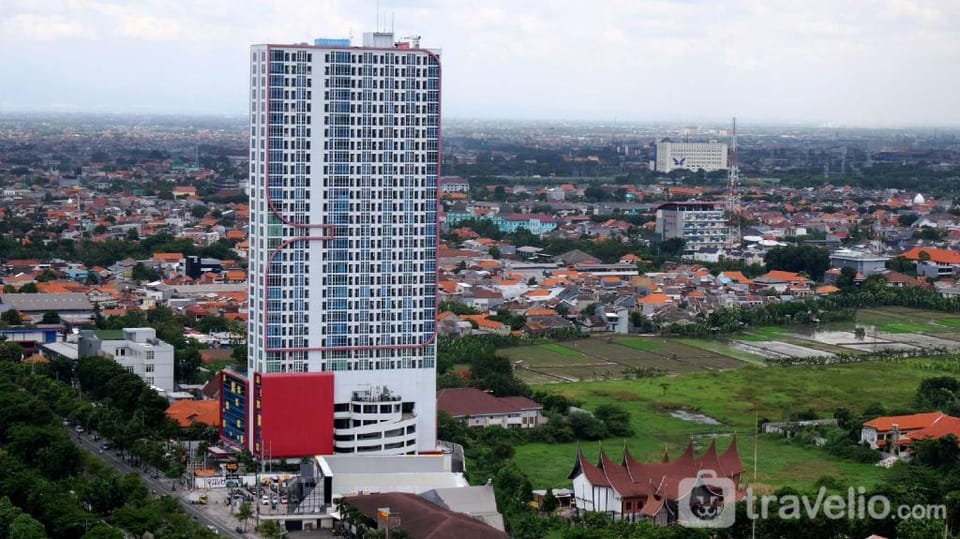 Good Deal 2BR at Tamansari Papilio By Travelio Apartment in Surabaya