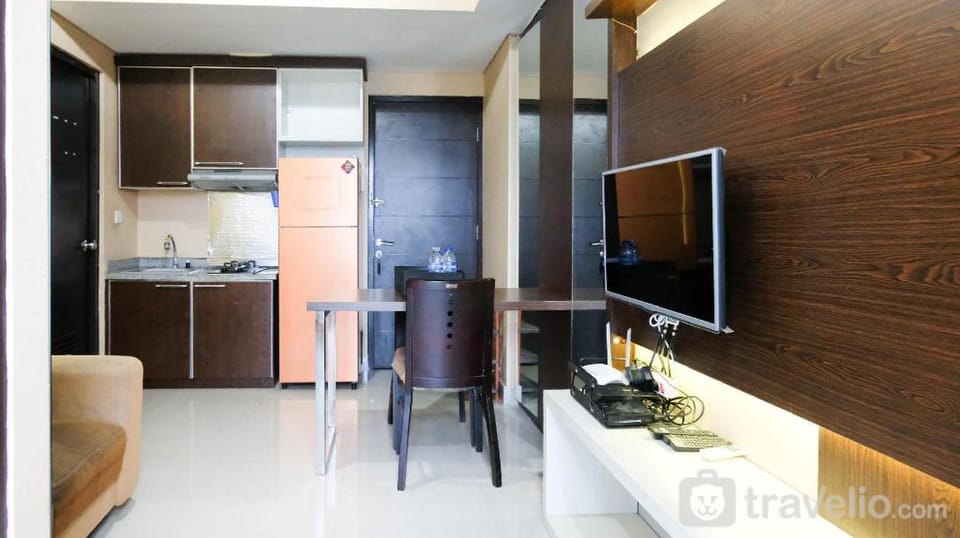 Good Deal 2BR at Tamansari Papilio By Travelio Apartment in Surabaya