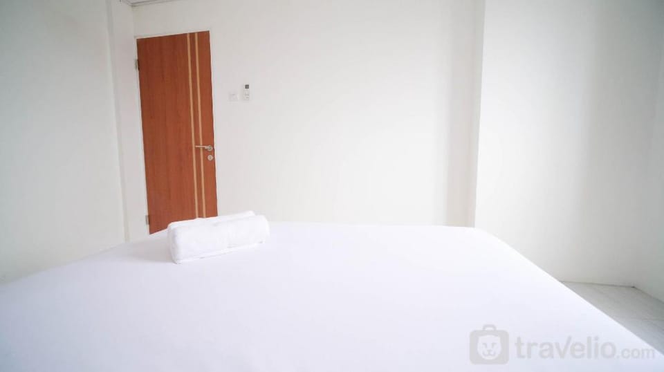 Best Tidy 2BR at Puncak Dharmahusada By Travelio Apartment in Surabaya
