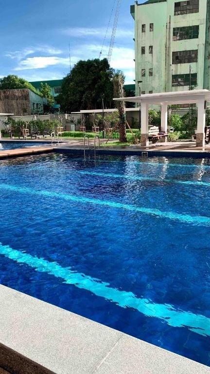 Condo in Manila - NordicLiving/NearLRT/Wifi Vacation rental in Quezon City