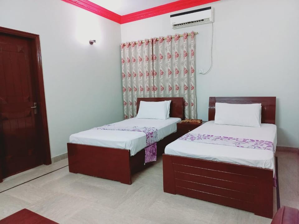Cosy Inn Karachi Guest House Hotel in Karachi