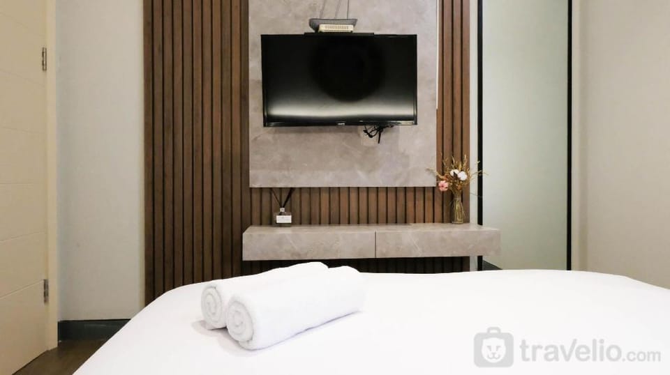 Aesthetic 2BR at Supermall Mansion Apt By Travelio Apartment in Surabaya