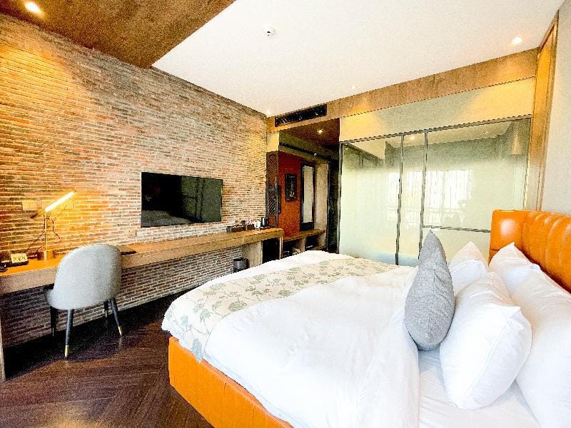Premier Suite King Bed with Bathtub by Habitat Apartment in Phnom Penh Province