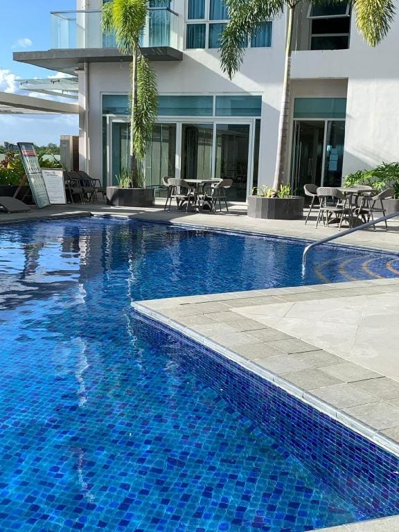Lovely & Relaxing Studio Unit in One Madison Place Vacation rental in Iloilo City